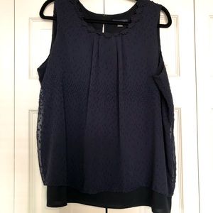 Navy blue textured flowing sleeveless blouse
